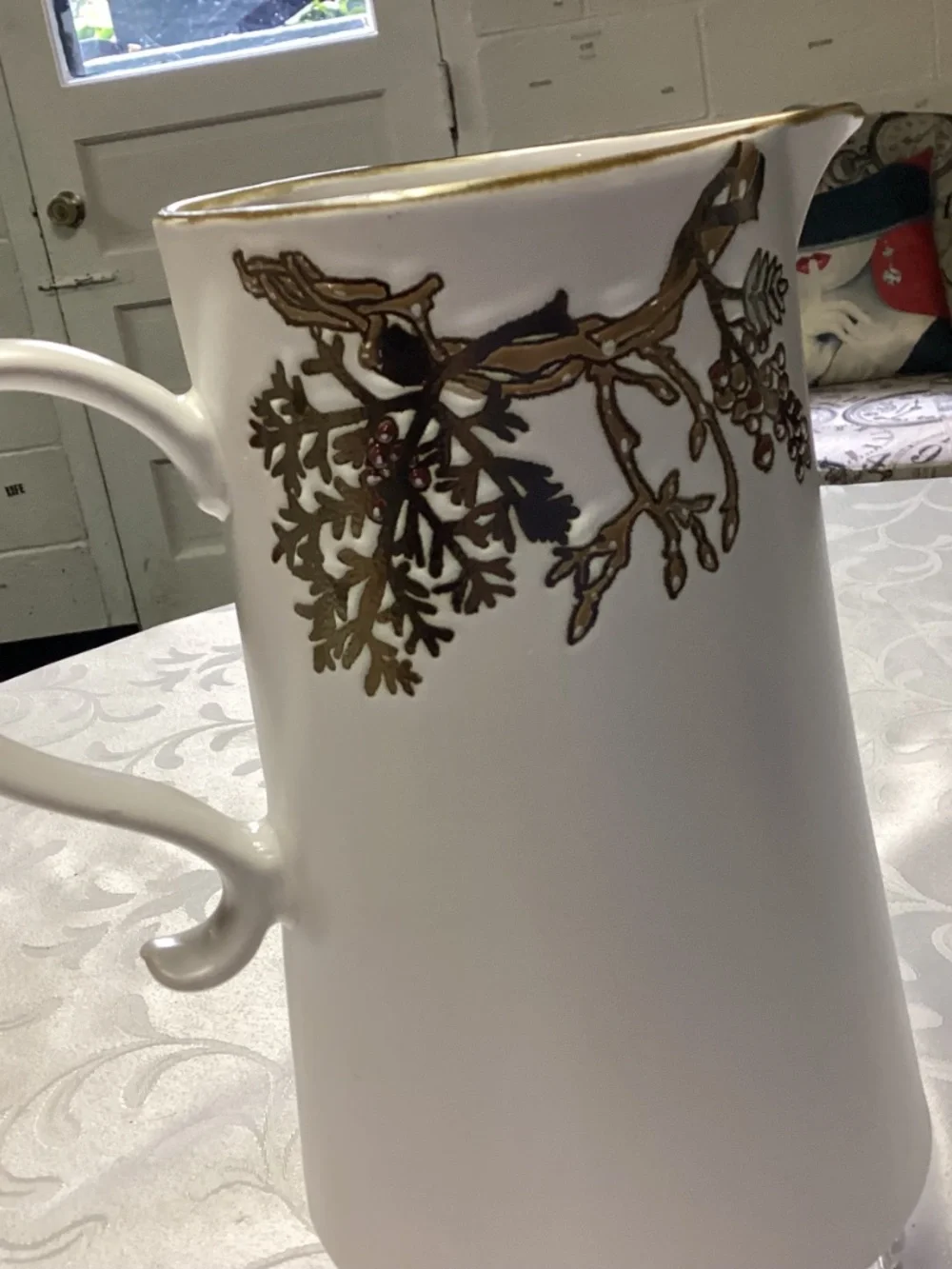 FAll themed pitcher tall cylindrical shape. Gold details too
